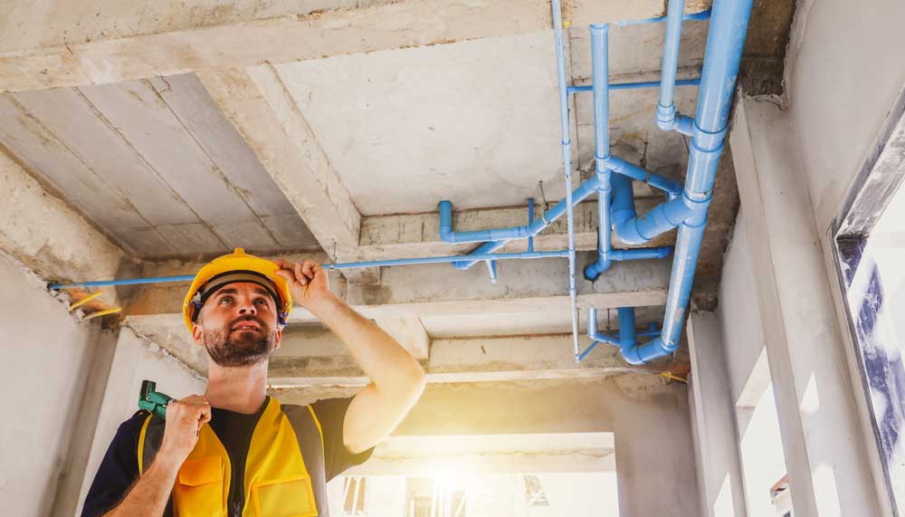 plumbing team repiping a home